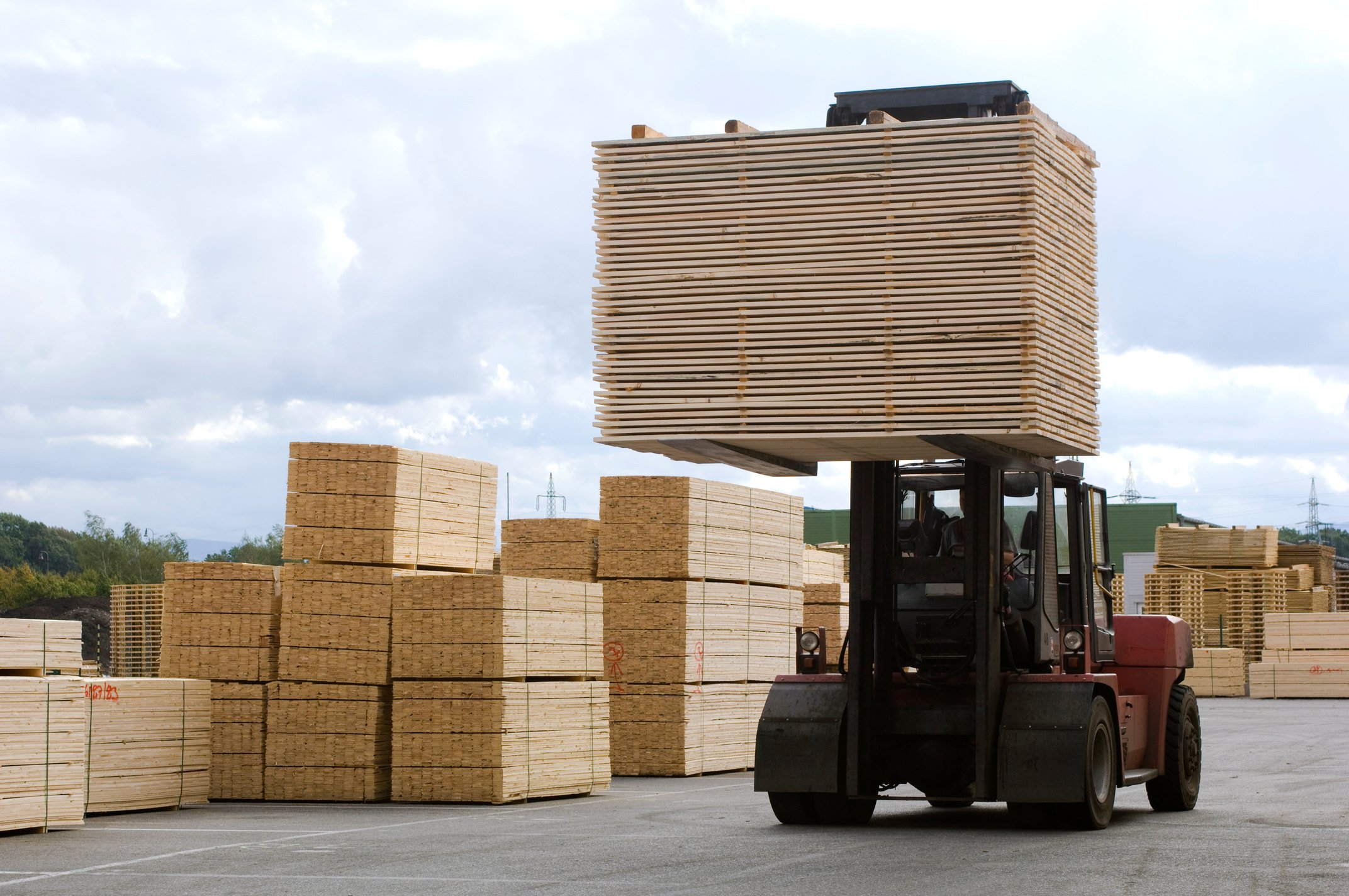 Lumber industry - transport finished planks by fork-lift truck