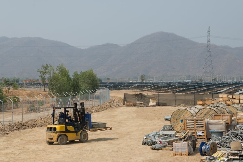 The fork lift in the outdoor warehouse of solar farm